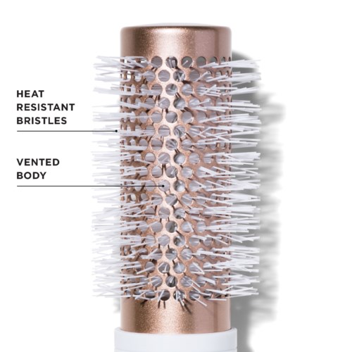 Vented body with heat-resistant bristles around it, in a cylindrical shape, likely an eyelash curler.