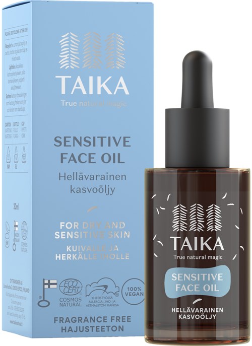 Blauwe doos en donkere fles met druppelaar, label zegt Taika Sensitive Face Oil voor droge en gevoelige huid.