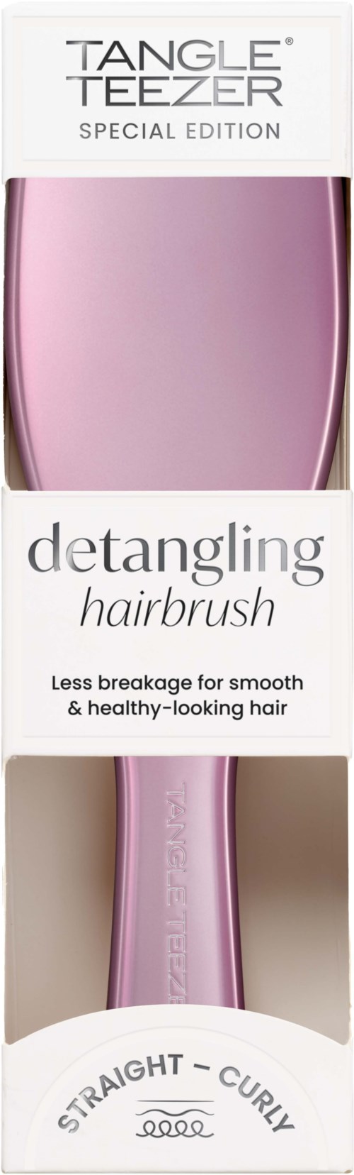 A pink hairbrush in packaging labeled 'Tangle Teezer' for straight or curly hair, reducing breakage and making hair healthy.