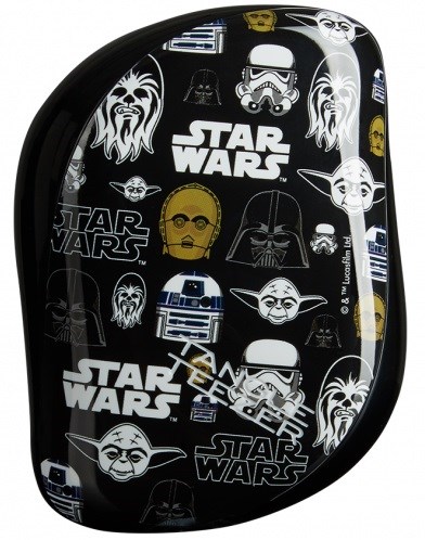 En svart bricka med vita och gula Star Wars-karaktärer och logotyper, inklusive Yoda, Darth Vader och stormtroopers.