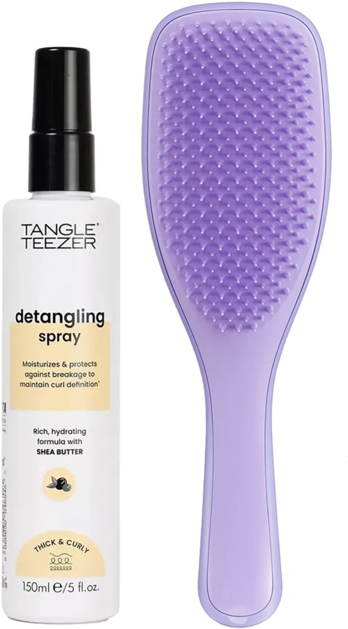 A detangling spray bottle and a purple hairbrush with silicone bristles.