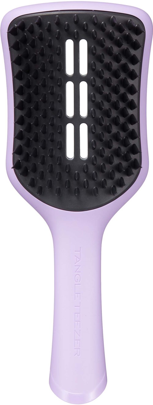 A purple hairbrush with a black, textured brushing surface and three white vertical lines on it.