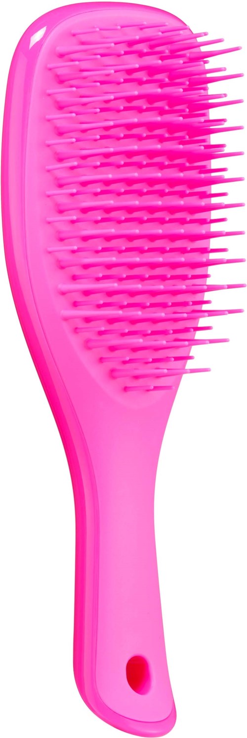 Pink hairbrush with many bristles, large handle, and a hole at the bottom for hanging.