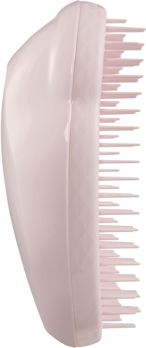 A pink hairbrush with a large curved handle and many short, plastic bristles. Mostly plain, soft pastel pink color.