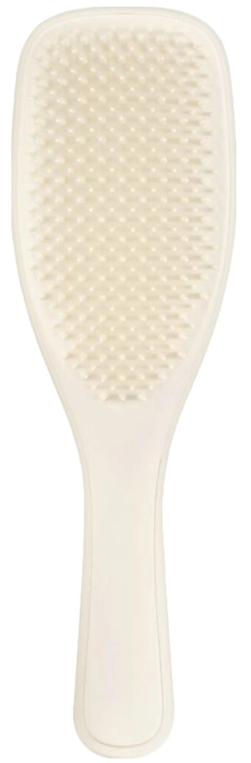 White scalp brush with a textured surface for hair and scalp care.