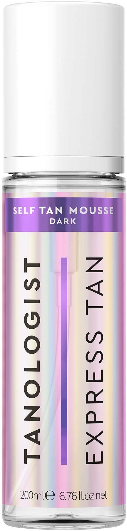 Biała butelka z fioletową etykietą, na której jest napisane 'Self Tan Mousse Dark' i 'TAN' oraz 'Express Tan'.