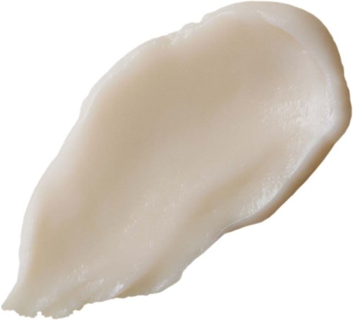 Ein Klecks weiße Creme oder Sauce auf weißem Hintergrund. Glatte und leicht glänzende Textur.