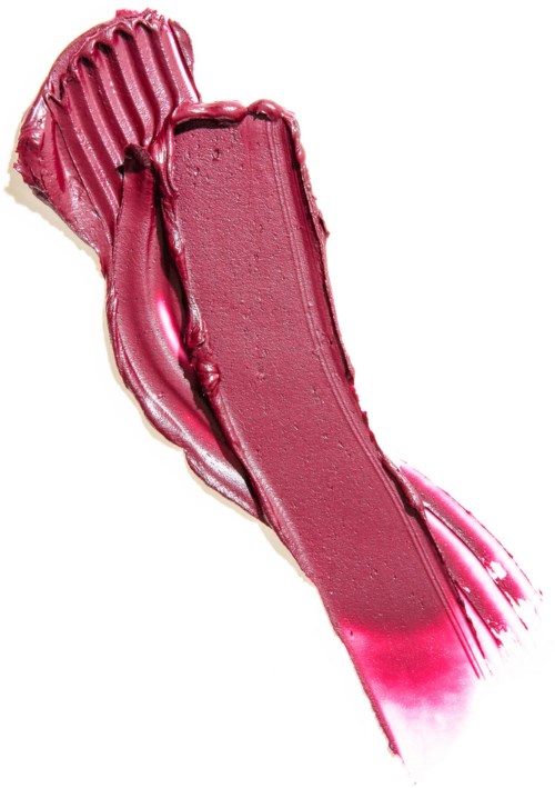 A smear of pink lipstick with shiny, smooth texture and a ridged, curved shape.
