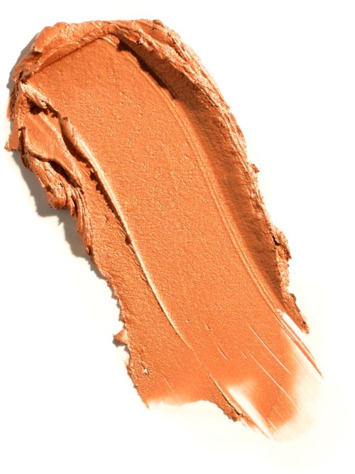 Orange makeup swatch on a white background with smooth and textured areas.