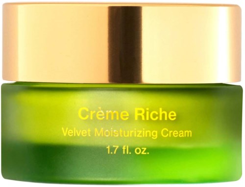 A green jar of velvet moisturizing cream with a gold lid, labeled 'Crème Riche' and 'Velvet Moisturizing Cream'.