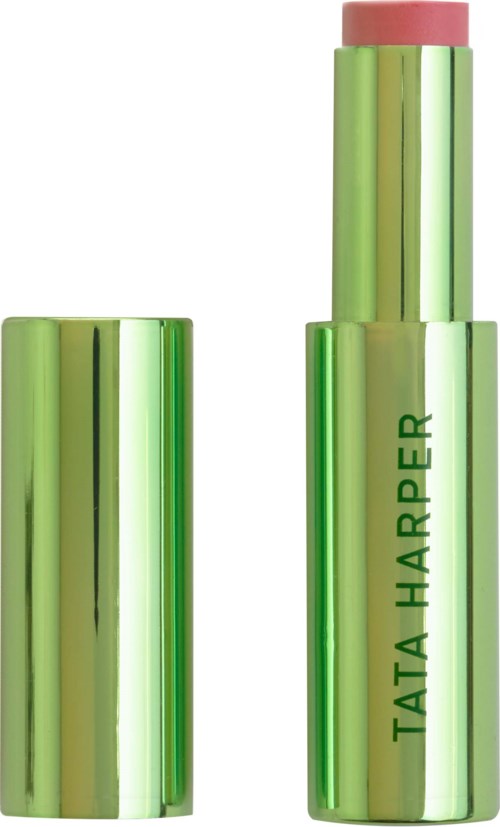 Bright green lipstick tube with "TATA HARPER" written on it, showing pink lipstick inside.