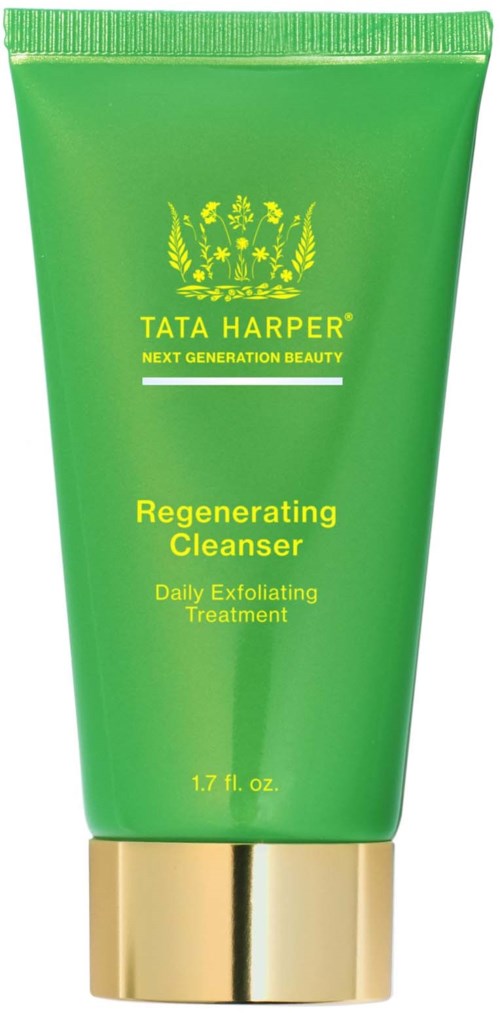 A green tube of Tata Harper Regenerating Cleanser with yellow text and a gold cap.