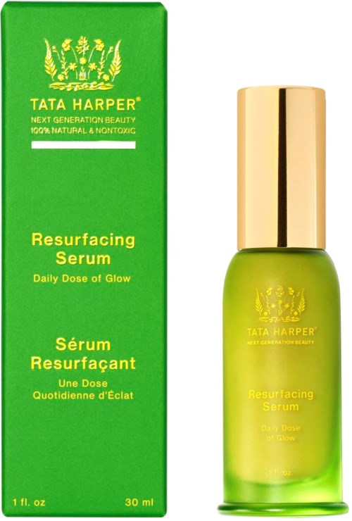 Green box and small green bottle with gold cap for Tata Harper Resurfacing Serum, promoting natural beauty and glow.
