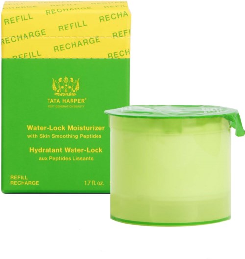 A green container with a lid and a bright yellow box. The box has the brand Tata Harper and says water-lock moisturizer.