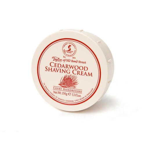 A round container of Cedarwood Shaving Cream with red and white label, displaying product details and brand name.