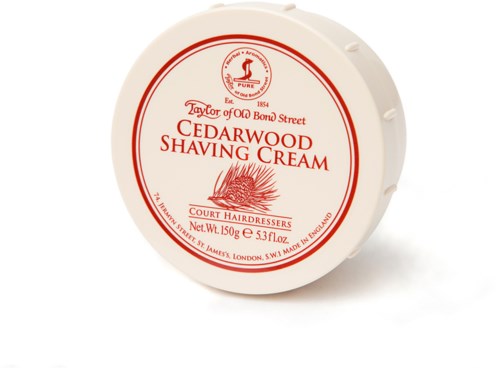 A round container of cedarwood shaving cream with a red and white label, includes company name and product details.