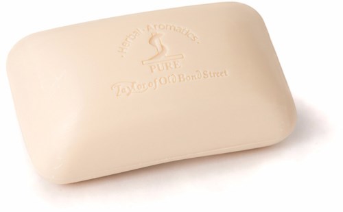 A plain beige soap with a logo and text embossed on it, including a swan and the words "PURE" and "Taylor of Old Bond Street."