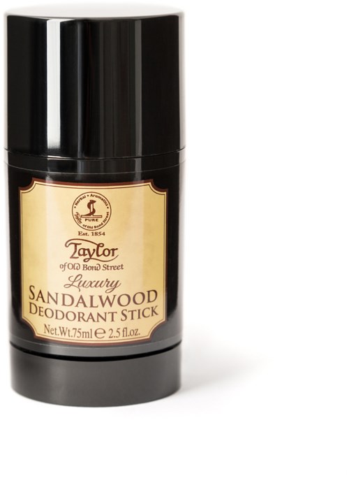 En svart deodorantstift med en ljusgul etikett som visar varumärke och doftnamn, sandalwood.