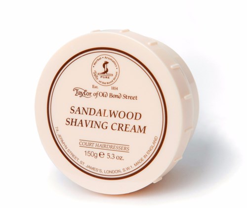 A round container labeled as sandalwood shaving cream from a brand called Taylor of Old Bond Street.