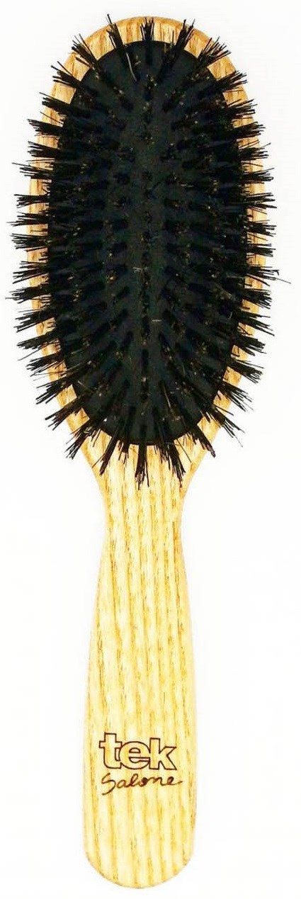 Eine Holzborste mit schwarzen Borsten und dem Text 'tek' am Griff.