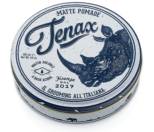 A round tin container with a blue and white label, showing a boar head and the text 'Jenaax' and 'Matte Pomade'.