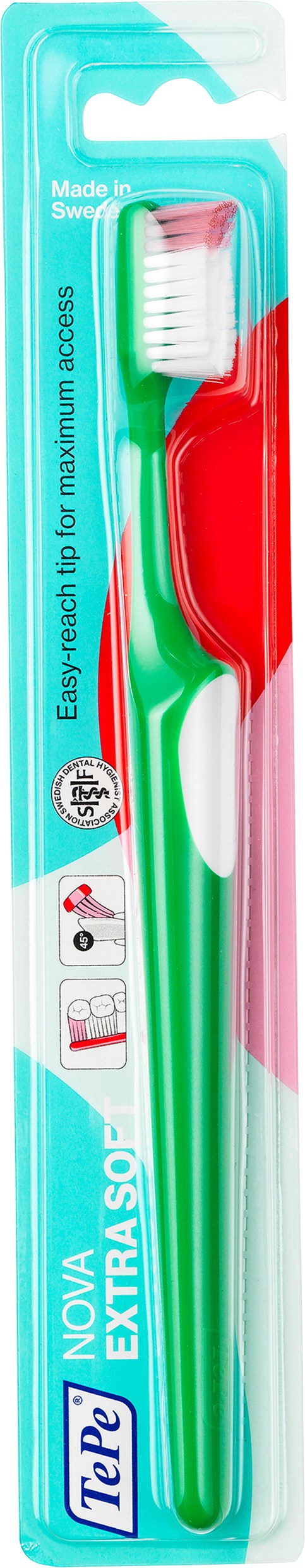 A toothbrush in plastic package with green handle, white and pink bristles, and text on packaging.