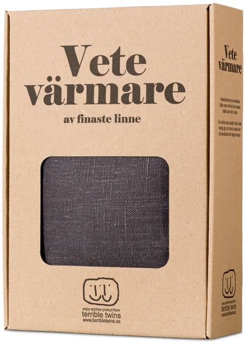 En brun pappeske med tekst og et vindu som viser et varmepledd inne.