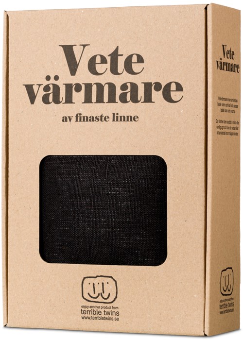 En brun pappeske med tekst om et produkt kalt 'Vete värmare'. Den har et lite vindu som viser en svart gjenstand inni.