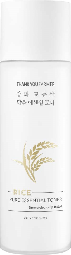 A white bottle of rice toner with gold wheat graphic, labeled 'Thank You Farmer' and 'Pure Essential Toner'.