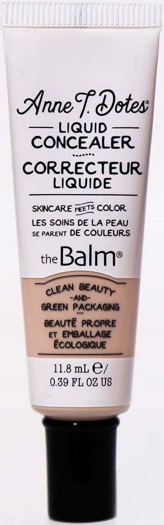 Tube concealer met zwarte dop, witte en beige label, merknaam Anne F. Dotes, productinformatie in het Engels en Frans.
