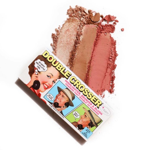 Mini make-up palette met roze en bruine tinten, vintage stripverhalen en dikke tekst.