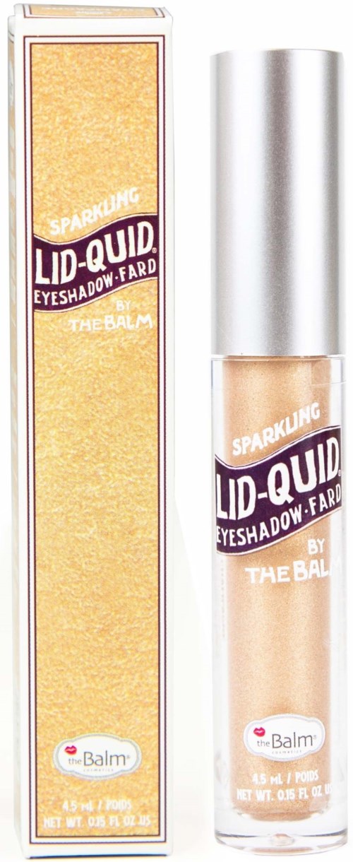 Een make-upproduct genaamd Sparkling Lid-Quid oogschaduw door The Balm, in een glazen tube met zilveren dop.