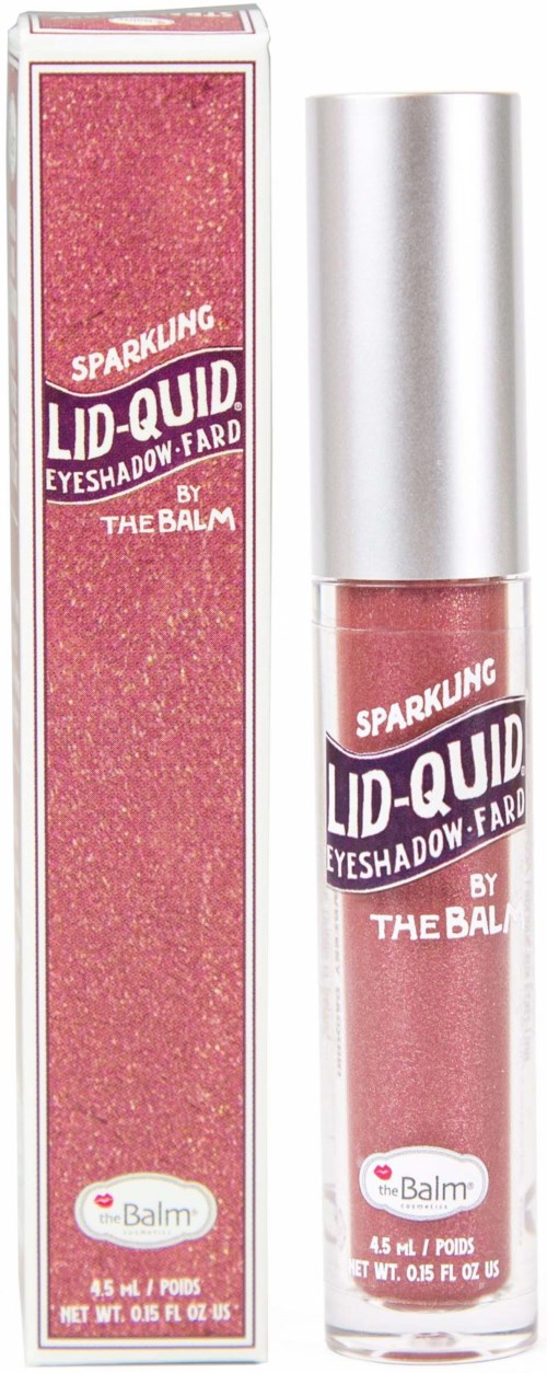 Sprankelende roze lipgloss met paarse en witte label, in doorzichtige tube naast doos.