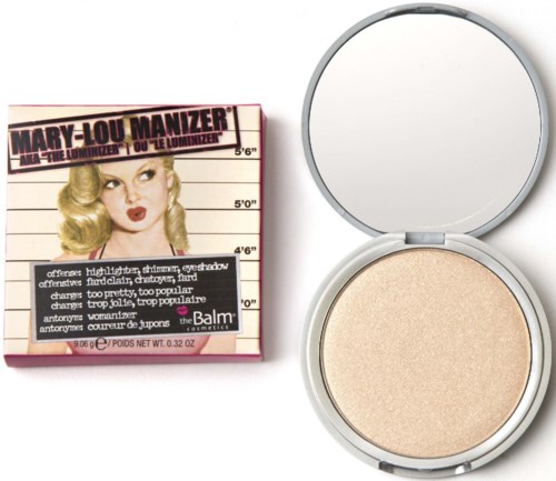 En box med Marilyn Monroe på och ett kompakt puder med spegel.