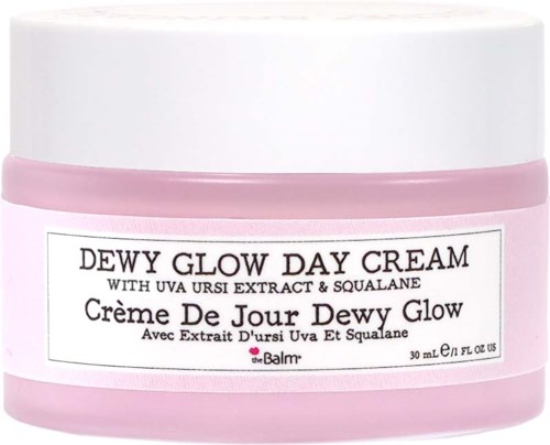 Een roze potje Dewy Glow Day Cream met UV-extract en squalane. Label heeft productnaam in Engels en Frans.