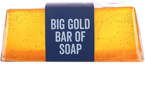 A large orange soap bar with a blue label that says "BIG GOLD BAR OF SOAP".