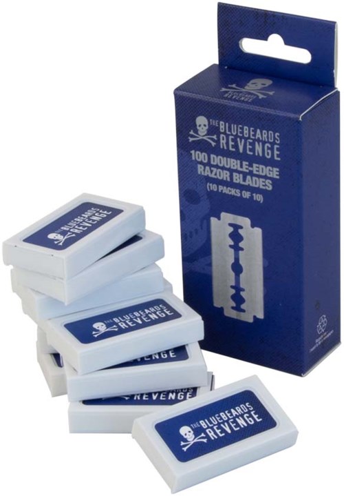 A box of razor blades with blue and white design and text, some blades are stacked nearby.