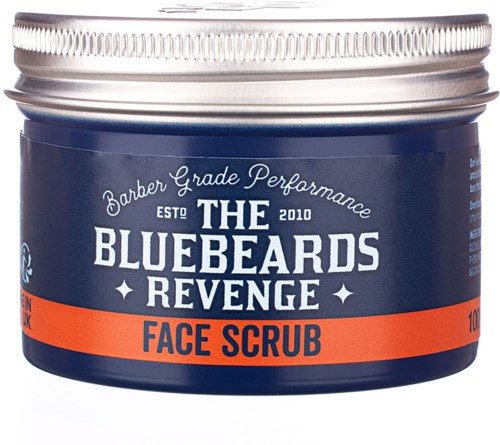 A blue and orange container of face scrub labeled "The Bluebeards Revenge" with silver lid.
