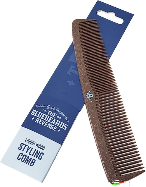 A brown liquid wood styling comb with a blue and white packaging label.