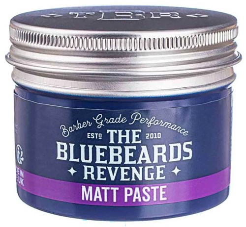 A blue container with a silver lid labeled 'The Bluebeards Revenge Matt Paste' for hair styling.