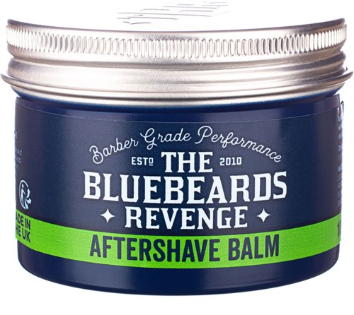 A blue jar of aftershave balm with green label, white text, and a silver lid. It says 'The Bluebeards Revenge.'