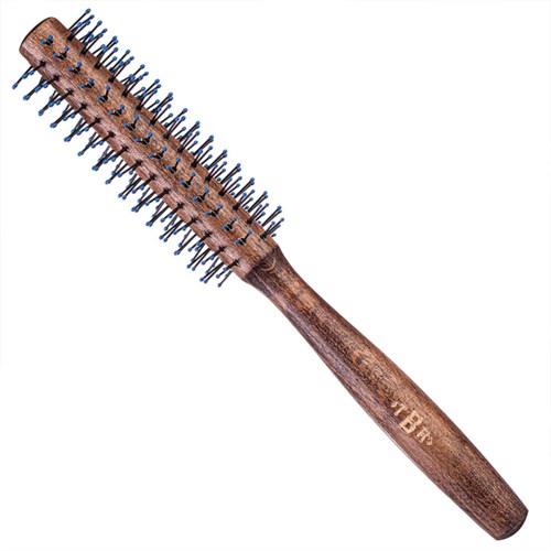 A wooden hairbrush with blue and black bristles and a handle with the text 'TBE'.