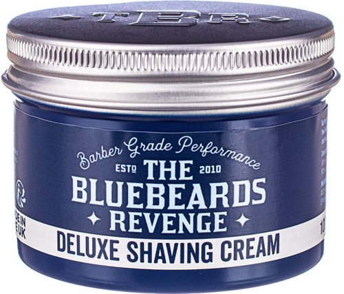 A blue jar of The Bluebeards Revenge Deluxe Shaving Cream with silver lid and white text.