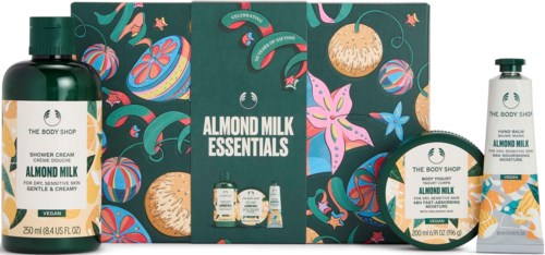 Almond Milk Essentials -sarja, pakkauksessa kukkakuvioita ja värikkäitä kuva-aiheita.