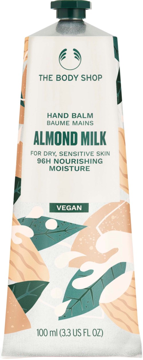 En tub med handbalsam med mandelmjölk från The Body Shop, för torr, känslig hud, vegansk, 100 ml.