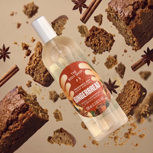 Gingerbread-tuoksuinen vartal spraysa The Body Shopin ympäri leivoksia ja tähtianista.