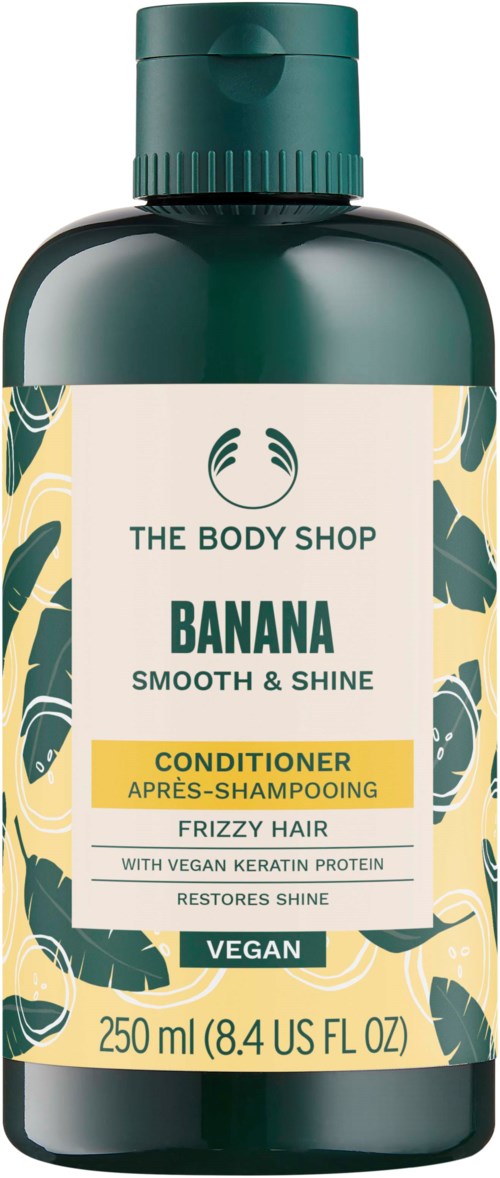 Grüne Flasche mit Bananengeruch-Spülung für krauses Haar, restores shine, vegan, 250ml.