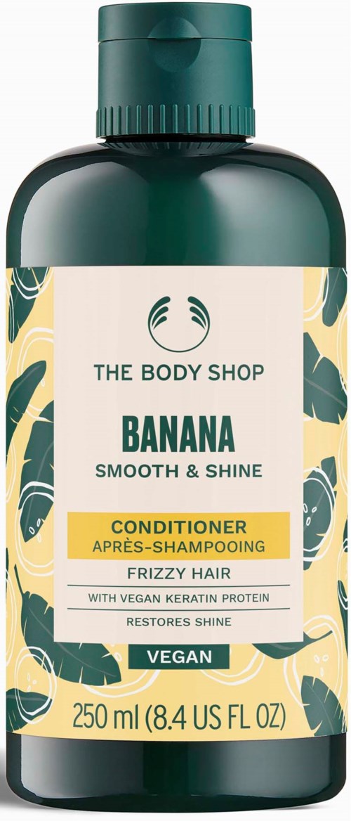 Banan-balsamflaske med grønt lokk, naturlig bladdesign og tekst for krusete hår, vegansk, 250 ml.