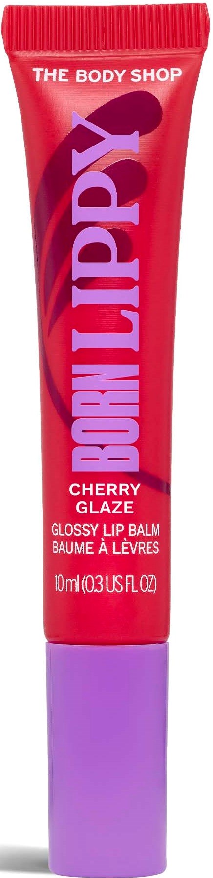 En röd glansrör med lila botten, märkt Born Lippy Cherry Glaze av The Body Shop.