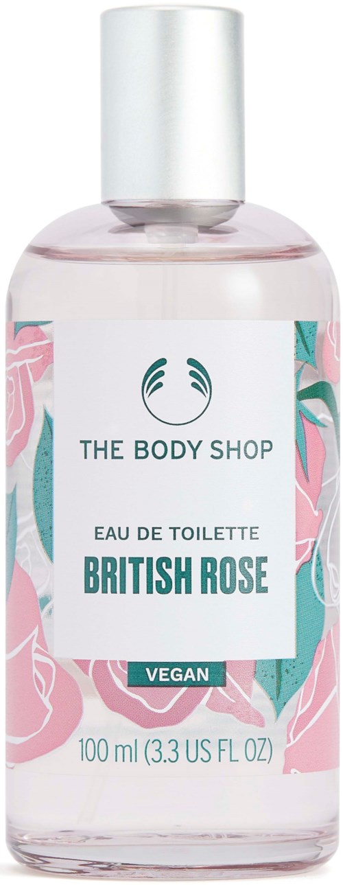 Eine klare Flasche mit Körperspray mit der Beschriftung 'British Rose' von The Body Shop, mit rosafarbenem und grünem Blumenmuster.